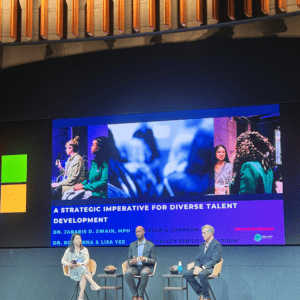 Lisa Yee moderating a panel with Dr. Ron Sinha and Dr. JaBaris Swain